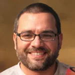 male professional headshot smiling